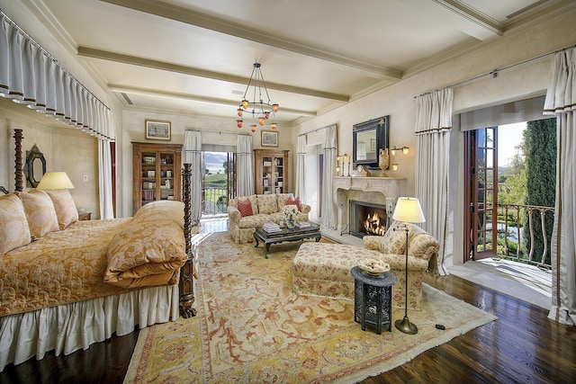 bedroom with an inviting chandelier, access to exterior, ornamental molding, beam ceiling, and dark hardwood / wood-style flooring