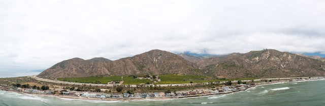 view of mountain feature with a water view