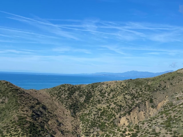 mountain view featuring a water view