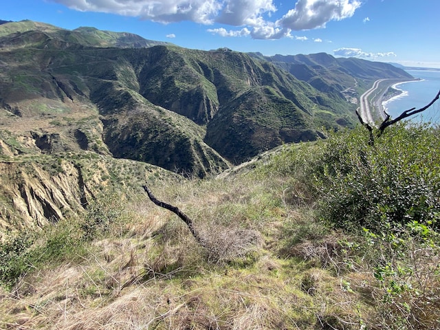 property view of mountains featuring a water view