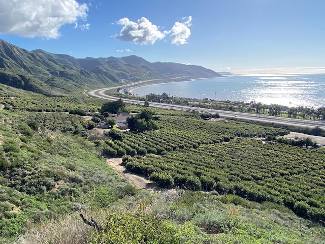 view of mountain feature featuring a water view