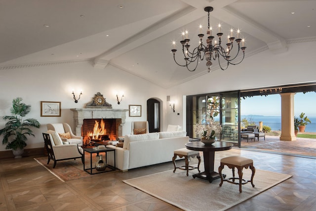 living room with a water and mountain view, a notable chandelier, dark parquet floors, and vaulted ceiling with beams