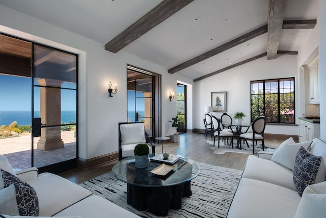 living room featuring a water view, dark hardwood / wood-style floors, and vaulted ceiling with beams