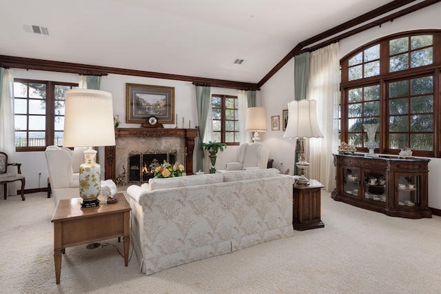 living room featuring a high end fireplace, a wealth of natural light, light carpet, and vaulted ceiling