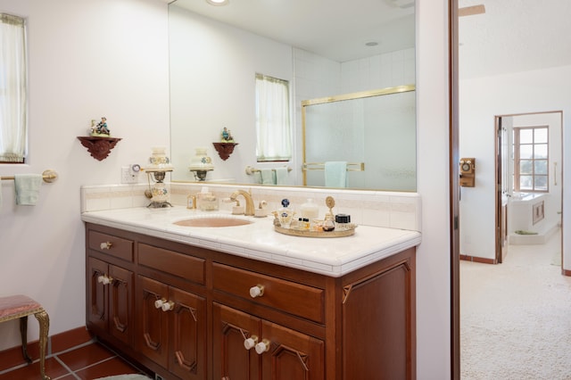 bathroom with oversized vanity and tile floors