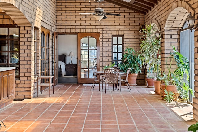 view of patio with ceiling fan and french doors