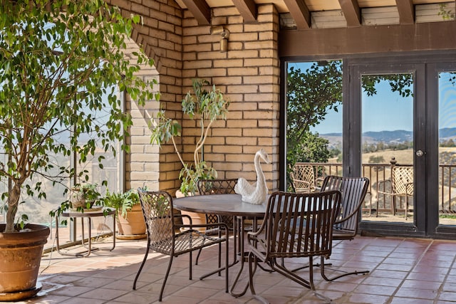 view of patio with a mountain view