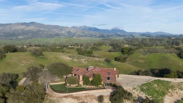 aerial view with a mountain view and a rural view