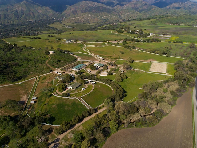 drone / aerial view with a mountain view and a rural view