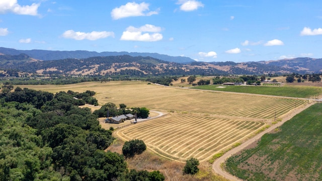 aerial view featuring a rural view and a mountain view