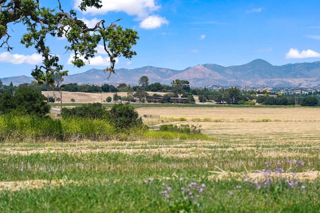 view of mountain feature with a rural view