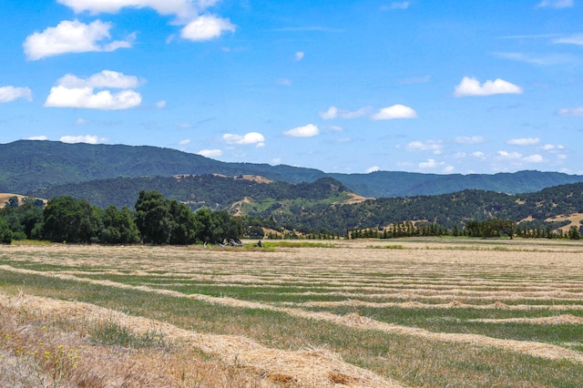 view of mountain feature with a rural view