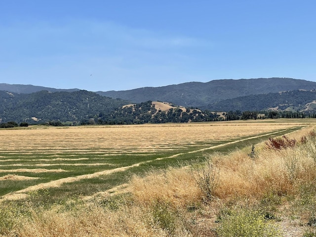 mountain view featuring a rural view