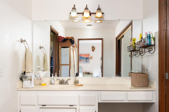 bathroom featuring visible vents and vanity
