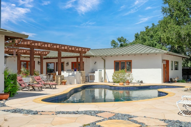 view of swimming pool with a pergola and a patio area