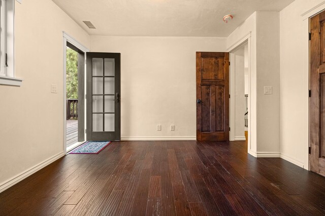 foyer with dark wood-type flooring