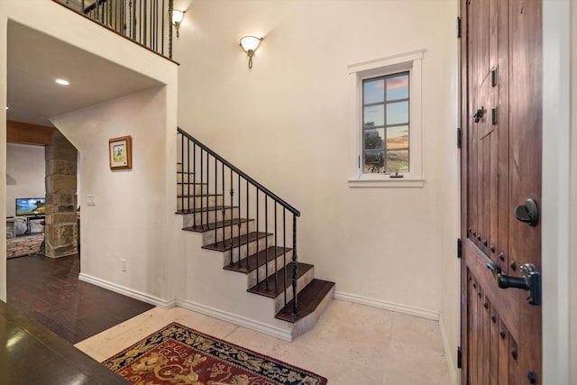 stairs with light tile flooring