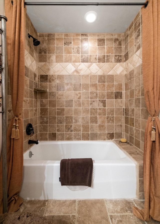 bathroom with shower / bath combination with curtain