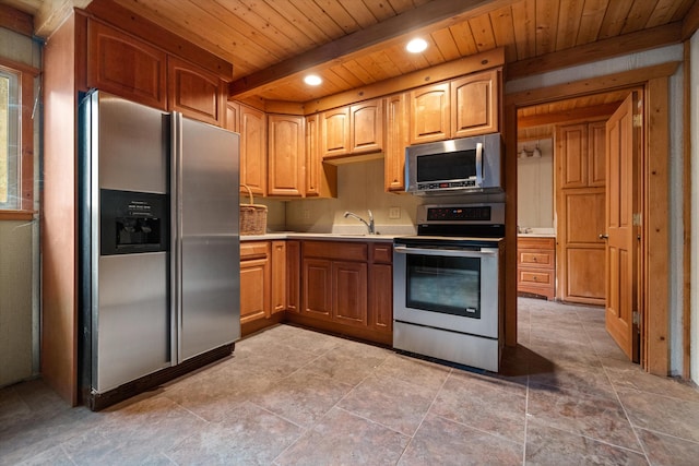 kitchen featuring wooden ceiling, stainless steel appliances, beamed ceiling, and tile flooring