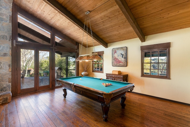 game room with pool table, dark hardwood / wood-style floors, and a wealth of natural light