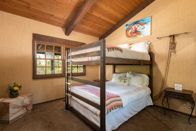 bedroom with lofted ceiling, dark carpet, and wooden ceiling