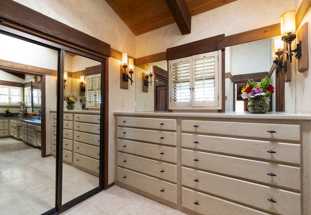 bathroom featuring tile flooring, wood ceiling, vanity, and lofted ceiling with beams