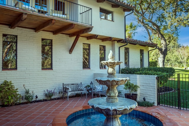 view of patio with a balcony