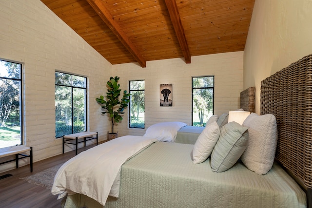 bedroom with wooden ceiling, vaulted ceiling with beams, and hardwood / wood-style floors