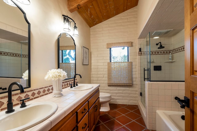 full bathroom with toilet, double sink, wooden ceiling, tile floors, and vaulted ceiling with beams