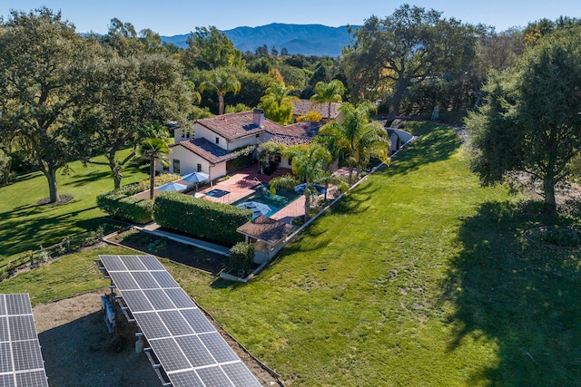 drone / aerial view featuring a mountain view