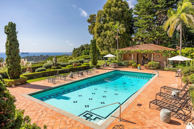 view of pool with a patio