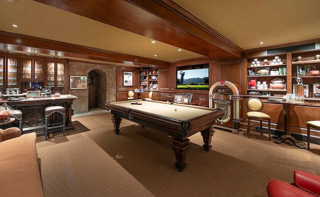 game room featuring light carpet, pool table, and bar area