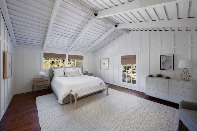 bedroom with multiple windows, dark hardwood / wood-style flooring, and lofted ceiling with beams