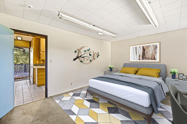 bedroom featuring light colored carpet