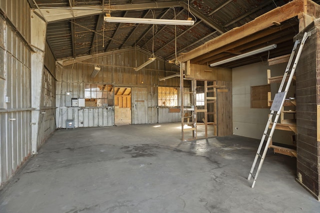 miscellaneous room with high vaulted ceiling