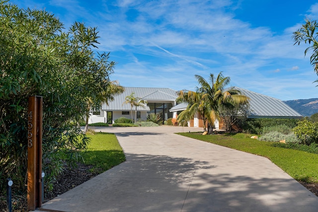 view of front of home with a front yard