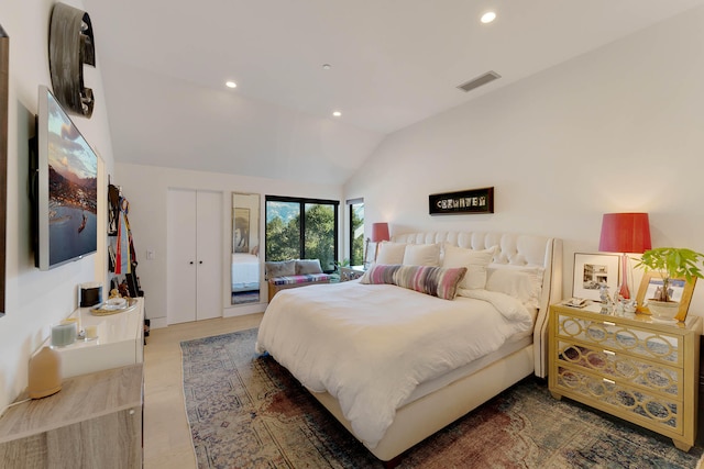 bedroom with vaulted ceiling