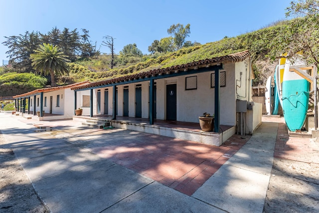 view of front of home featuring a playground