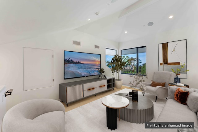 living room featuring lofted ceiling with beams