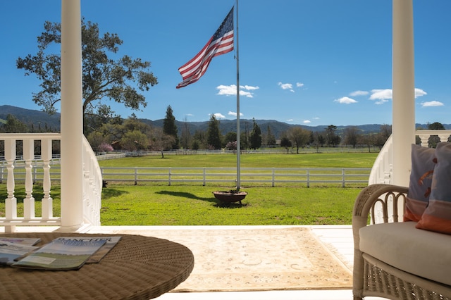 view of patio / terrace with a rural view