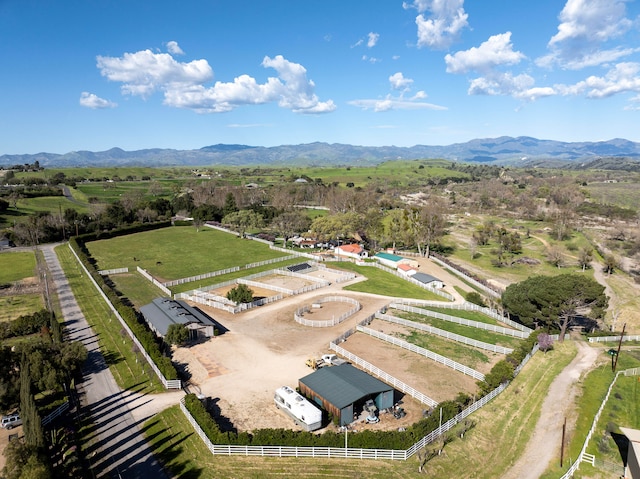 birds eye view of property featuring a rural view and a mountain view