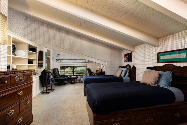 carpeted bedroom with brick wall and beam ceiling