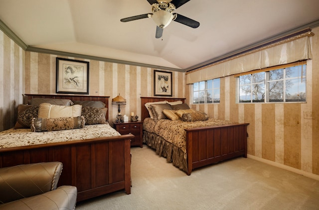 carpeted bedroom with ceiling fan and lofted ceiling