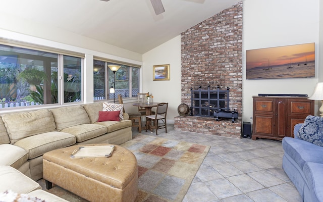 living room featuring light tile patterned floors, high vaulted ceiling, and ceiling fan