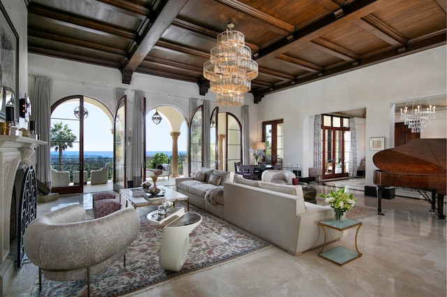 living room with beamed ceiling, coffered ceiling, wood ceiling, a chandelier, and french doors