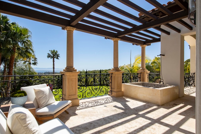 view of terrace with a pergola