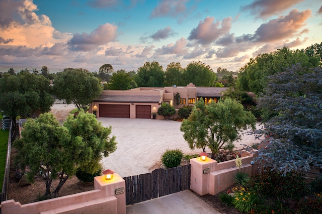 adobe home with a garage