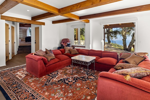 living room with beamed ceiling and hardwood / wood-style floors