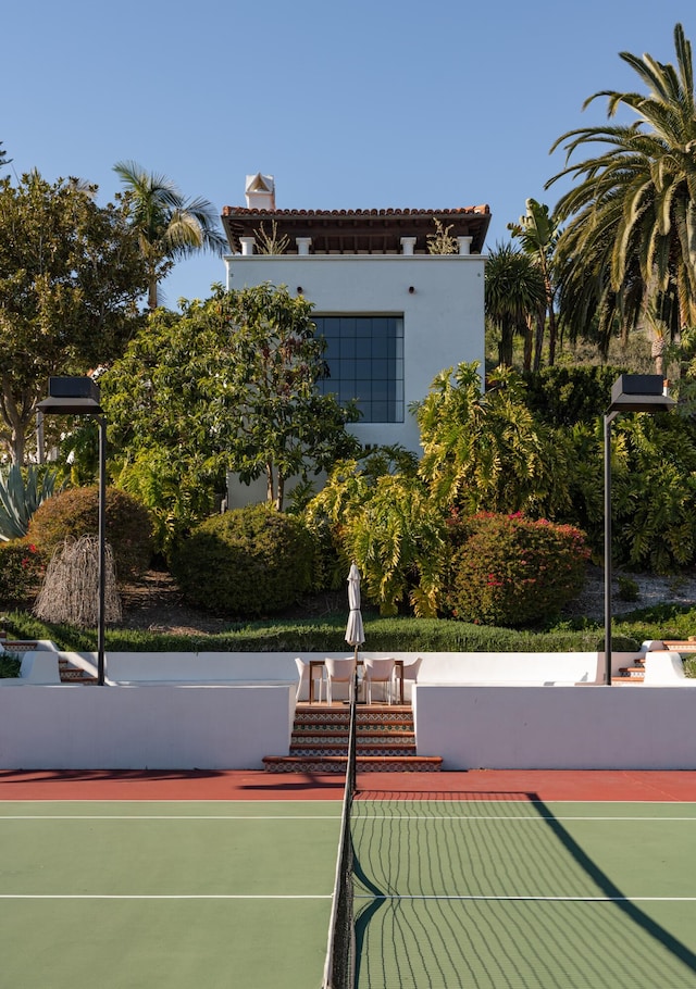 view of tennis court with basketball court