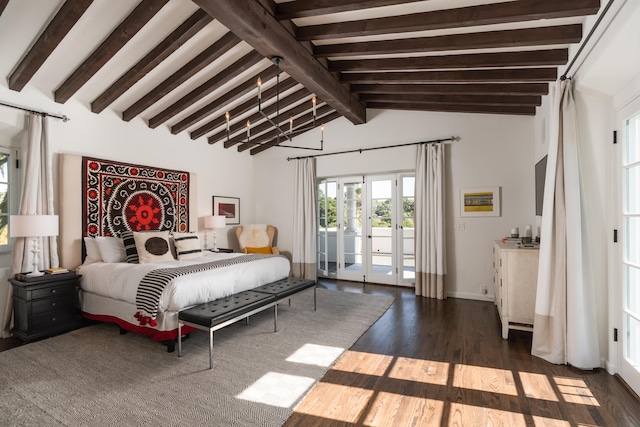 bedroom featuring french doors, dark hardwood / wood-style flooring, access to outside, beam ceiling, and a chandelier